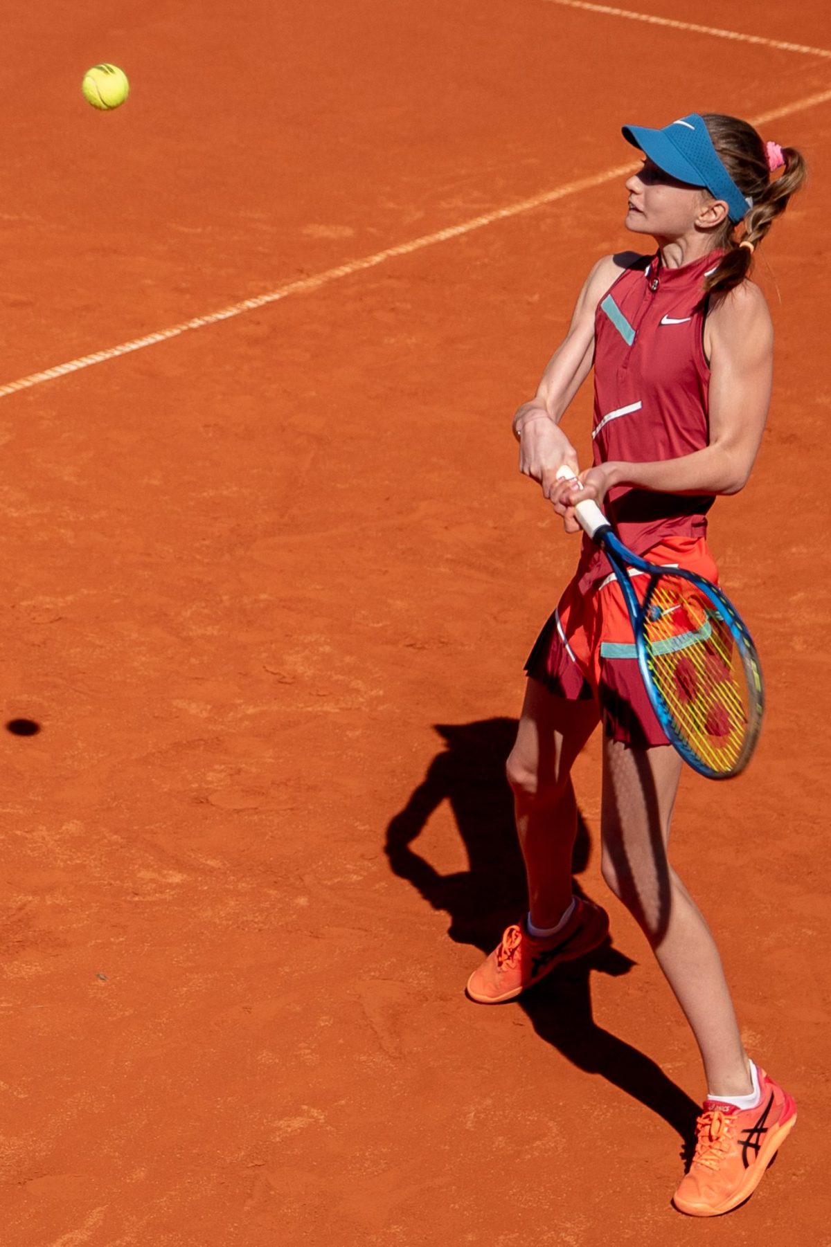 Girl playing tennis at the sunny tennis court at Ljubicic Tennis Academy