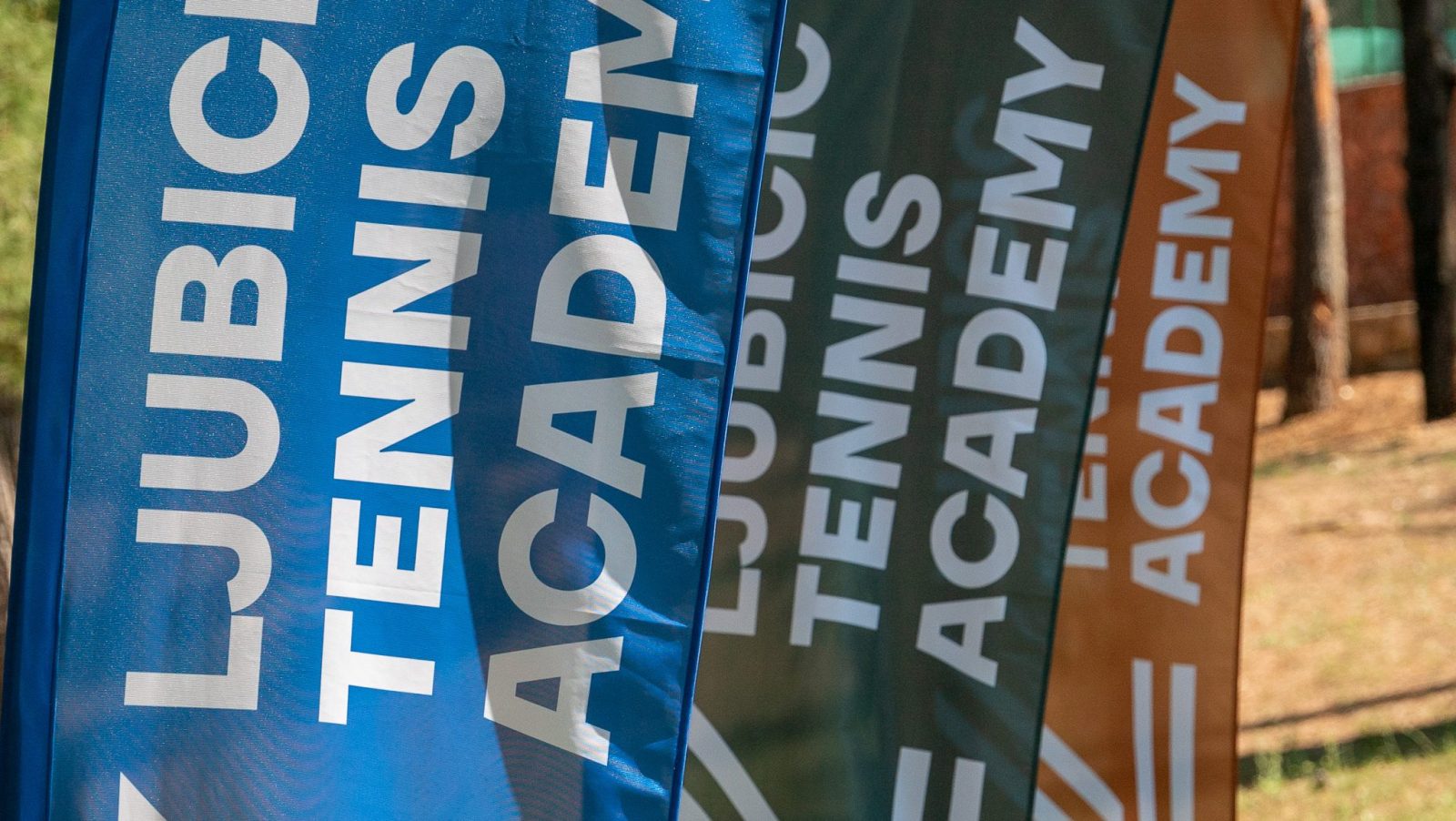 Ljubicic Tennis Academy banners on the tennis court